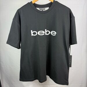 NEW Bebe Plus sport black short sleeve with sport patch woman’s shirt Size 1X